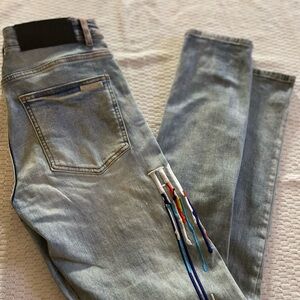 Stylish Light Blue Jeans with Colorful Accents